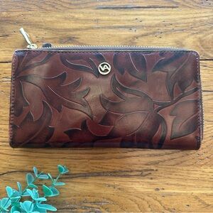 Valentina Embossed Leather Zip Around Wallet with a Leaf Motif Pattern in Brown